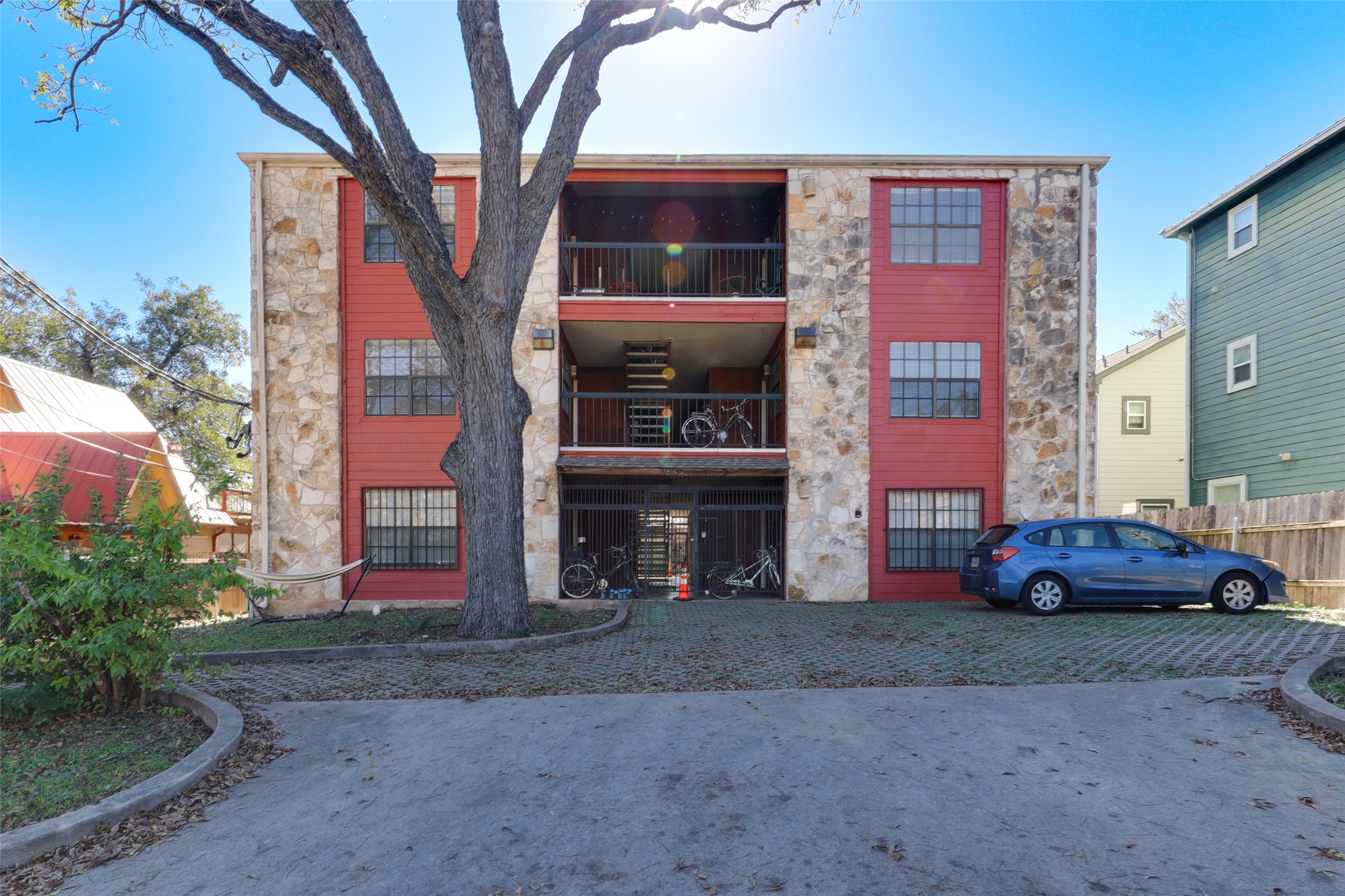 1903 East 20th Street Austin, TX 78722 - Photo 1 of 13 a front view of a house with parking space