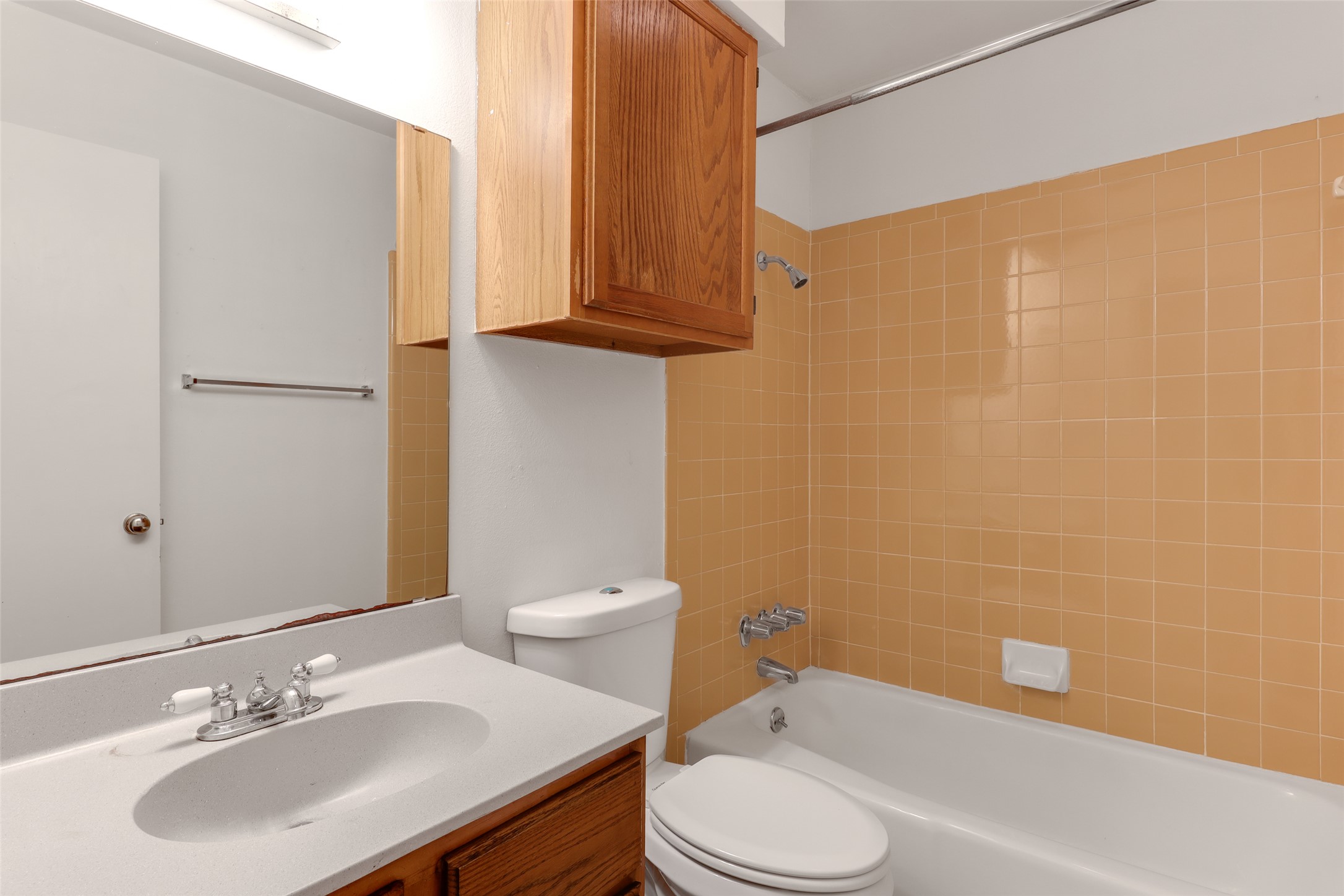 1903 East 20th Street Austin, TX 78722 - Photo 11 of 13 a bathroom with a sink a toilet and shower