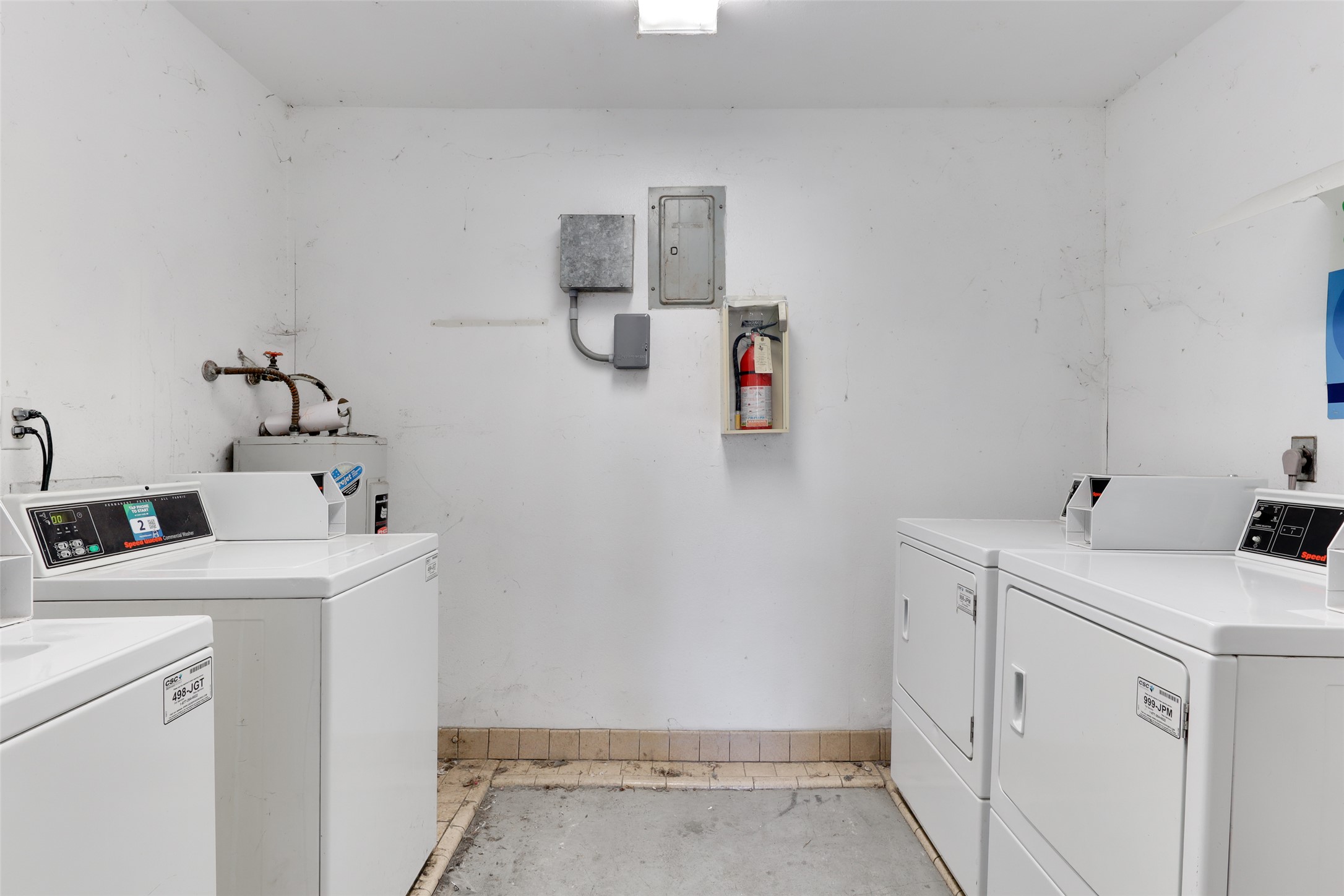 1903 East 20th Street Austin, TX 78722 - Photo 13 of 13 a utility room with dryer and washer
