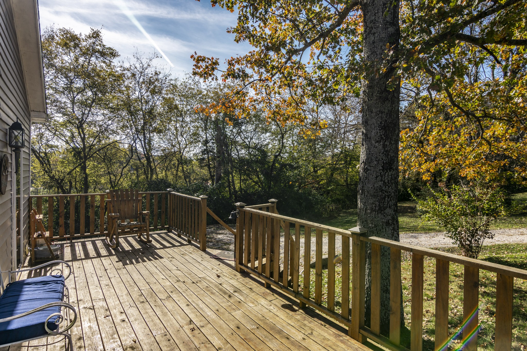 4289 Murfreesboro Road Franklin, TN 37067 - Photo 14 of 50 a balcony with wooden floor and trees