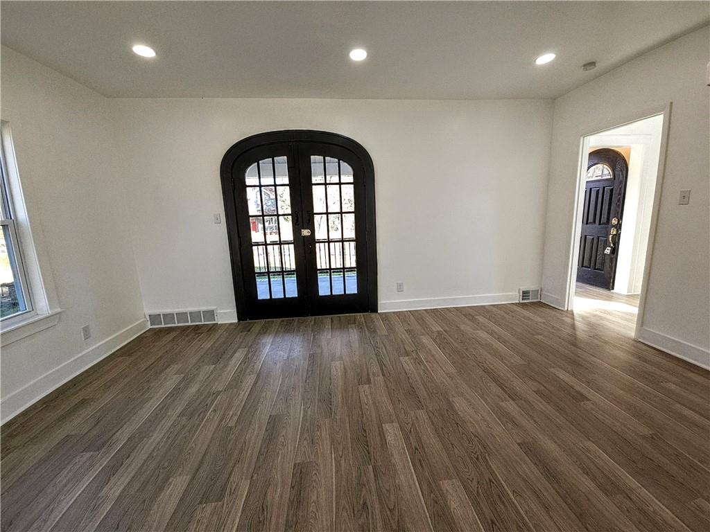 10200 Frankstown Road Pittsburgh, PA 15235 - Photo 15 of 47 an empty room with wooden floor and a window