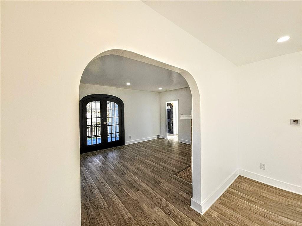 10200 Frankstown Road Pittsburgh, PA 15235 - Photo 17 of 47 a view of a room with wooden floor and a window