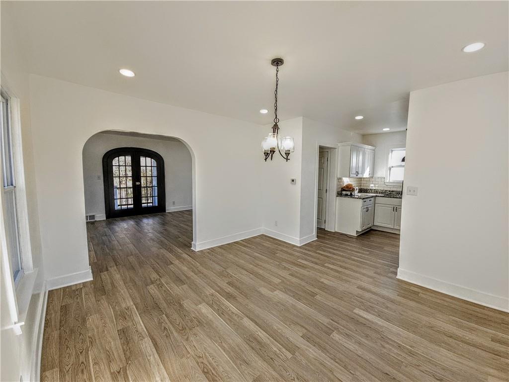 10200 Frankstown Road Pittsburgh, PA 15235 - Photo 18 of 47 a view of a kitchen with a sink and wooden floor