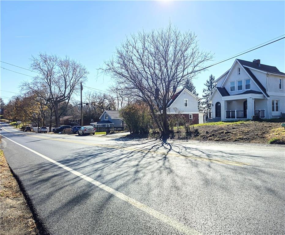 10200 Frankstown Road Pittsburgh, PA 15235 - Photo 2 of 47 a view of large house with a yard and large trees