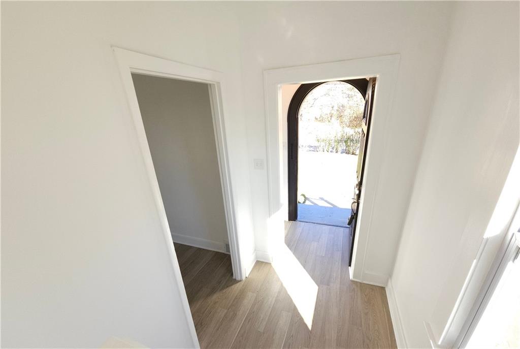 10200 Frankstown Road Pittsburgh, PA 15235 - Photo 25 of 47 view of a room with wooden floor washer and dryer