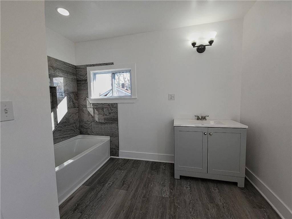 10200 Frankstown Road Pittsburgh, PA 15235 - Photo 29 of 47 a bathroom with a bathtub and a sink