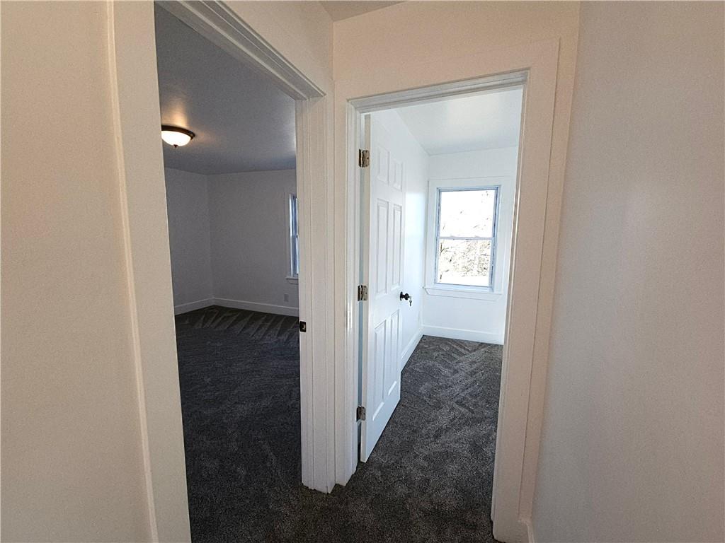 10200 Frankstown Road Pittsburgh, PA 15235 - Photo 38 of 47 a view of a hallway with wooden floor