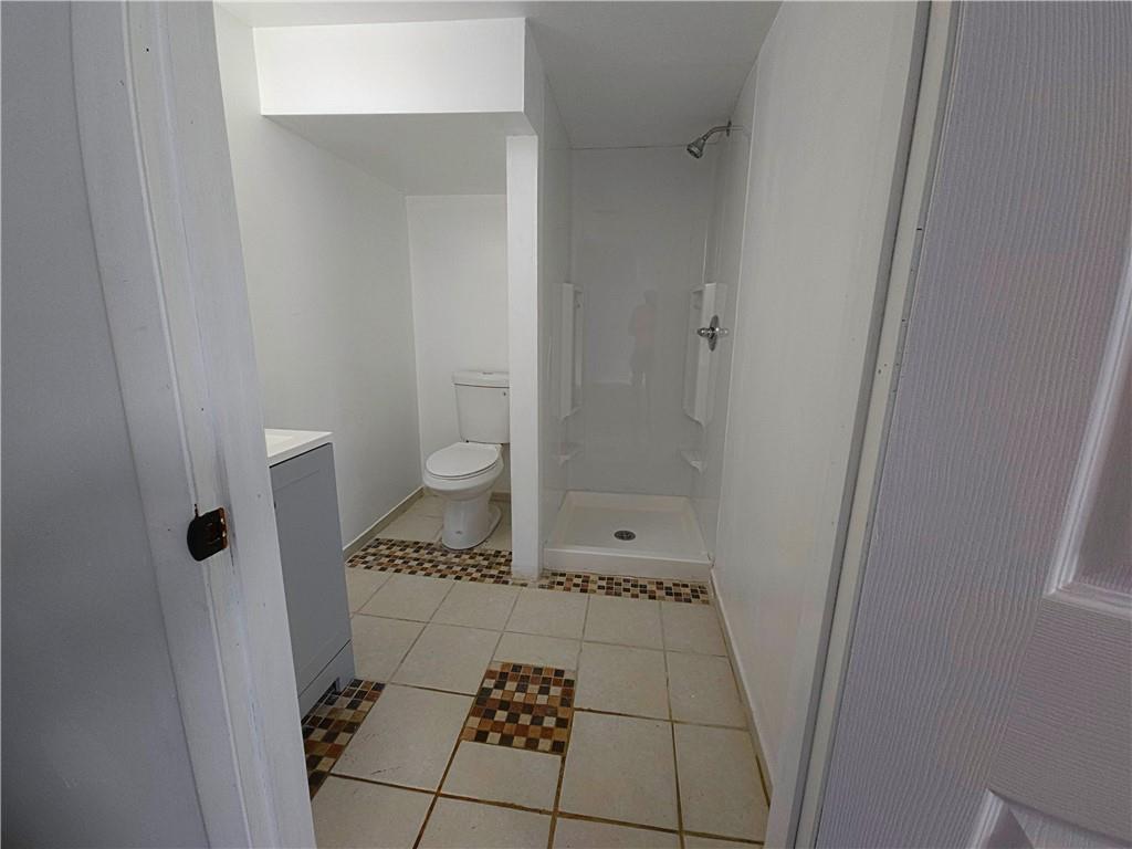 10200 Frankstown Road Pittsburgh, PA 15235 - Photo 43 of 47 a bathroom with a toilet and a shower