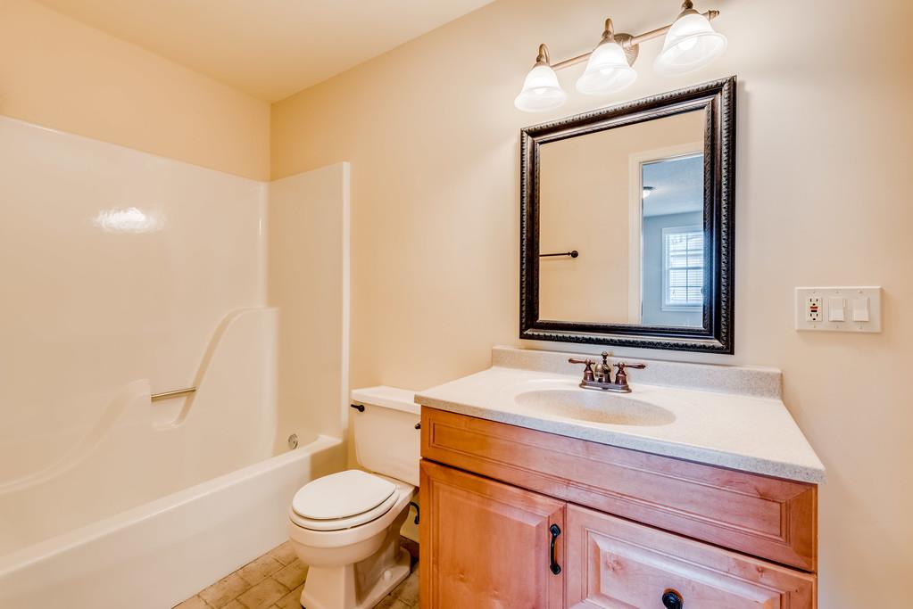 3801 Franklin Road Lebanon, TN 37090 - Photo 16 of 29 a bathroom with a sink a toilet and a mirror