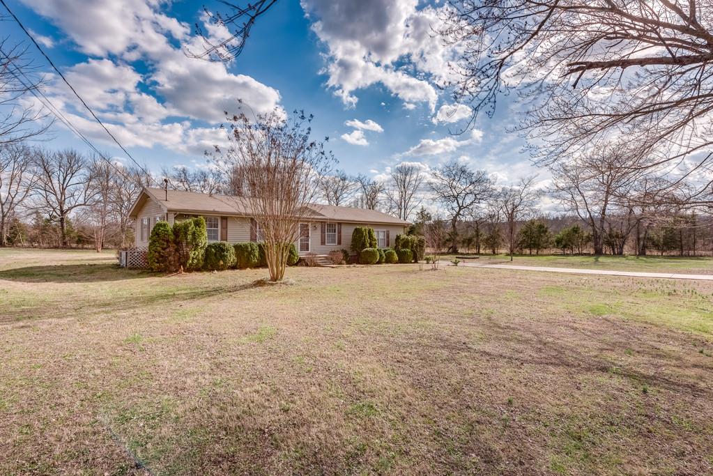 3801 Franklin Road Lebanon, TN 37090 - Photo 3 of 29 a view of a large house with a yard