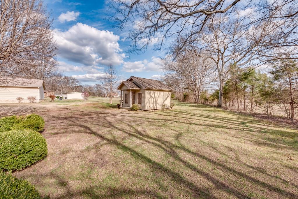 3801 Franklin Road Lebanon, TN 37090 - Photo 25 of 29 a front view of a house with a yard and trees