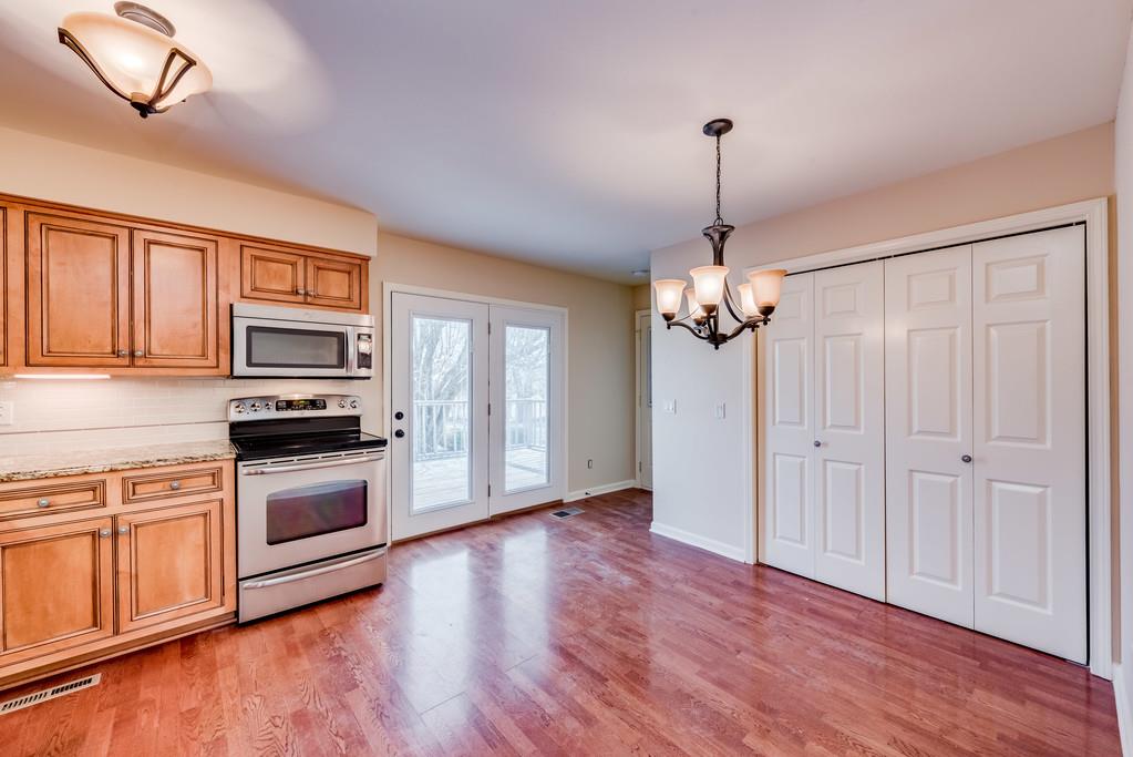 3801 Franklin Road Lebanon, TN 37090 - Photo 7 of 29 a kitchen with wooden floors and granite counter tops