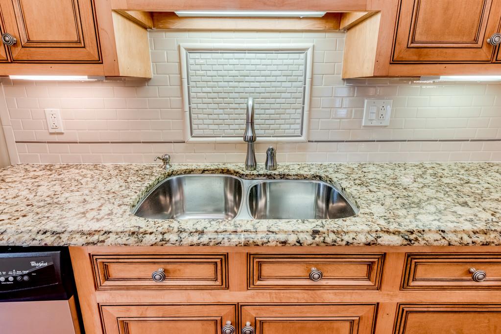 3801 Franklin Road Lebanon, TN 37090 - Photo 8 of 29 a kitchen with granite countertop a sink and a stove