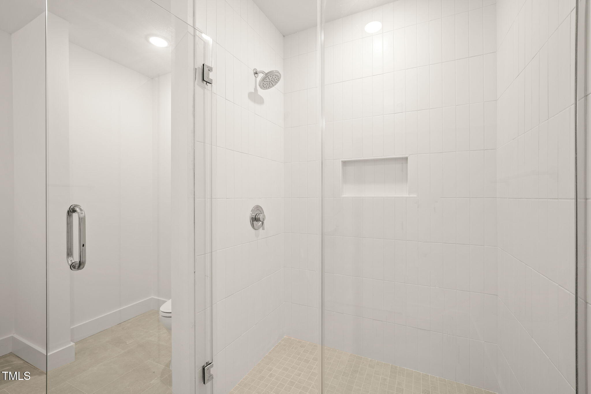 29 Enterprise Street, Unit 209 Raleigh, NC 27607 - Photo 16 of 46 a bathroom with a shower
