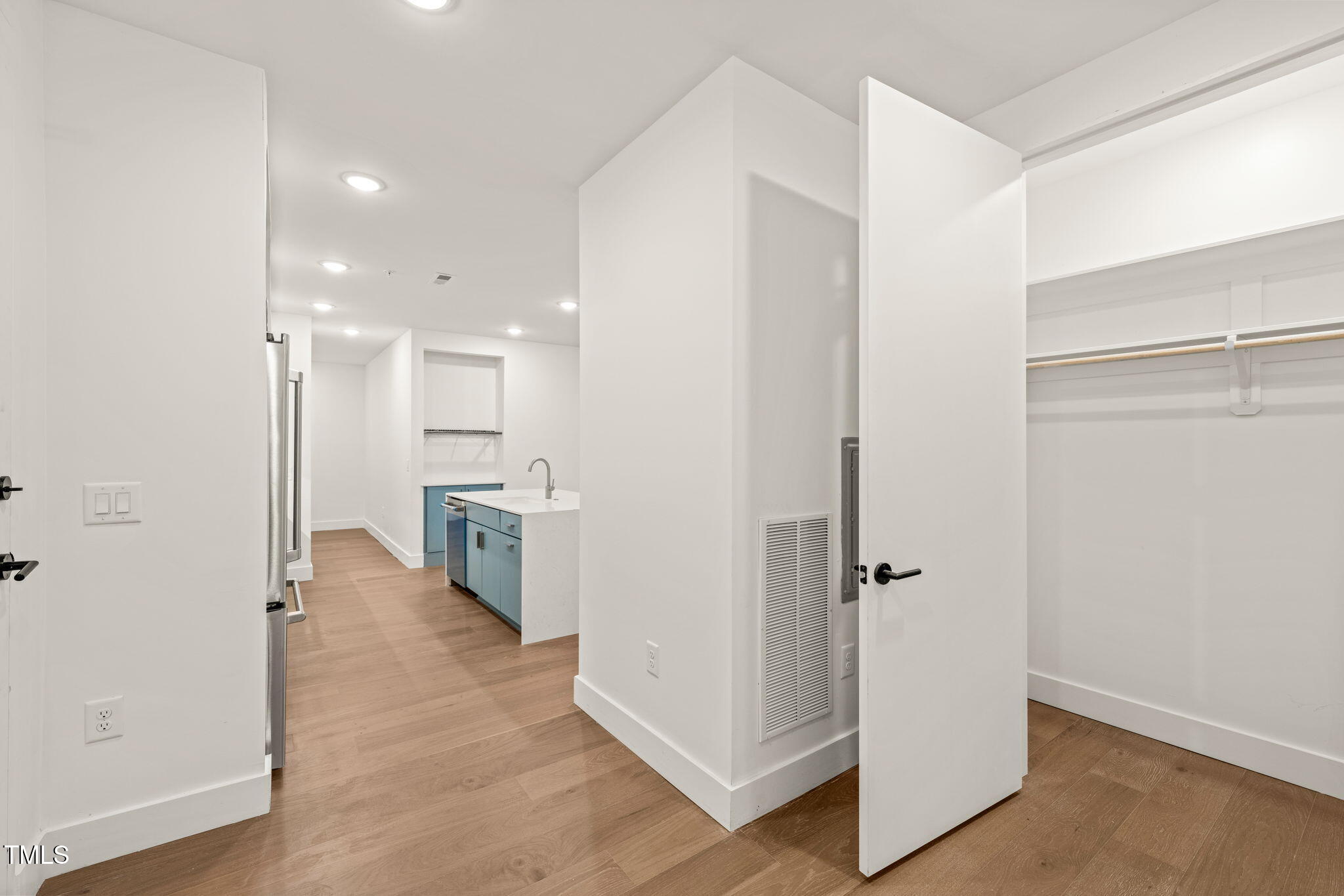 29 Enterprise Street, Unit 209 Raleigh, NC 27607 - Photo 17 of 46 a view of a hallway with a living room