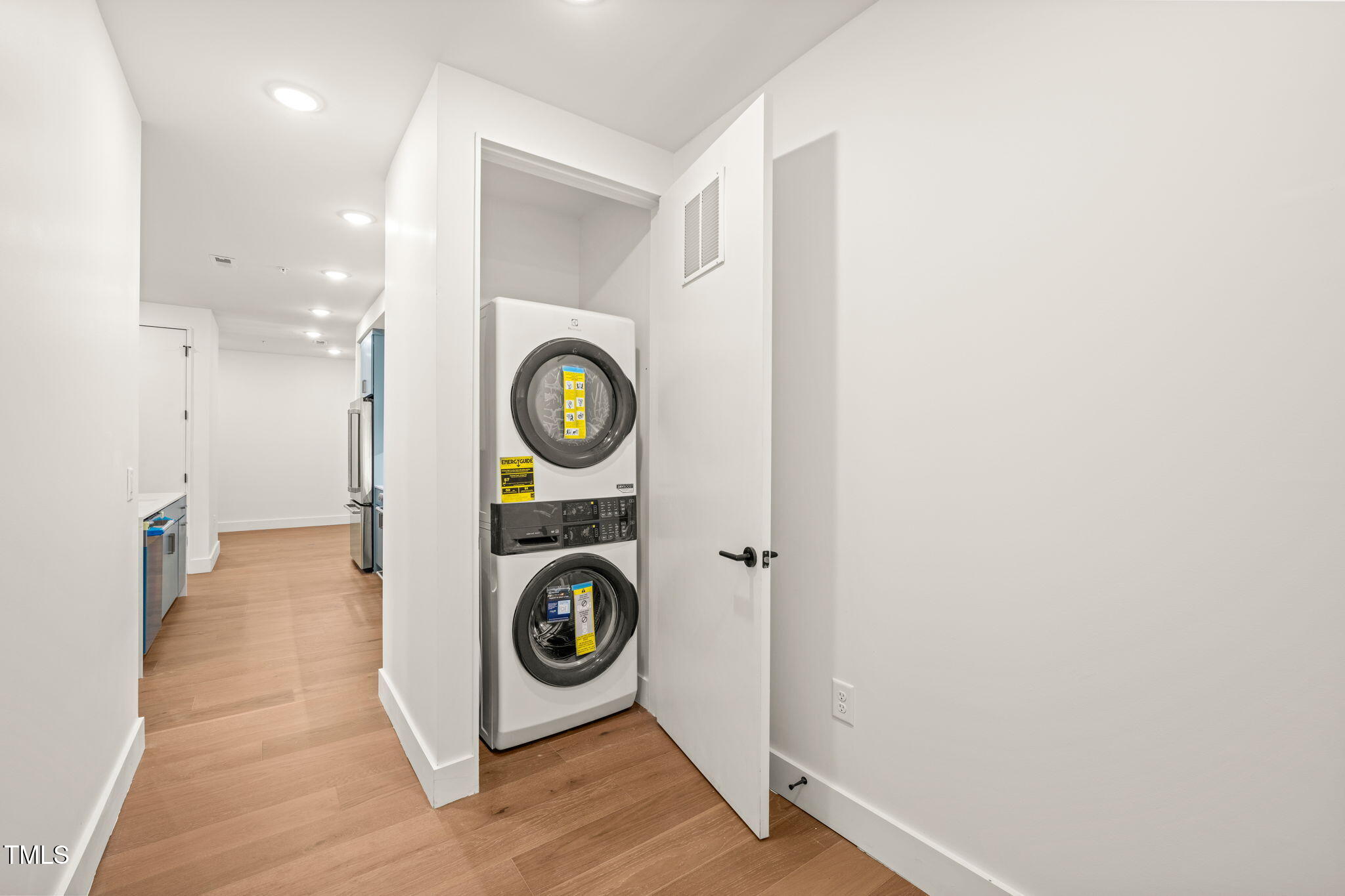 29 Enterprise Street, Unit 209 Raleigh, NC 27607 - Photo 18 of 46 a utility room with dryer and washer
