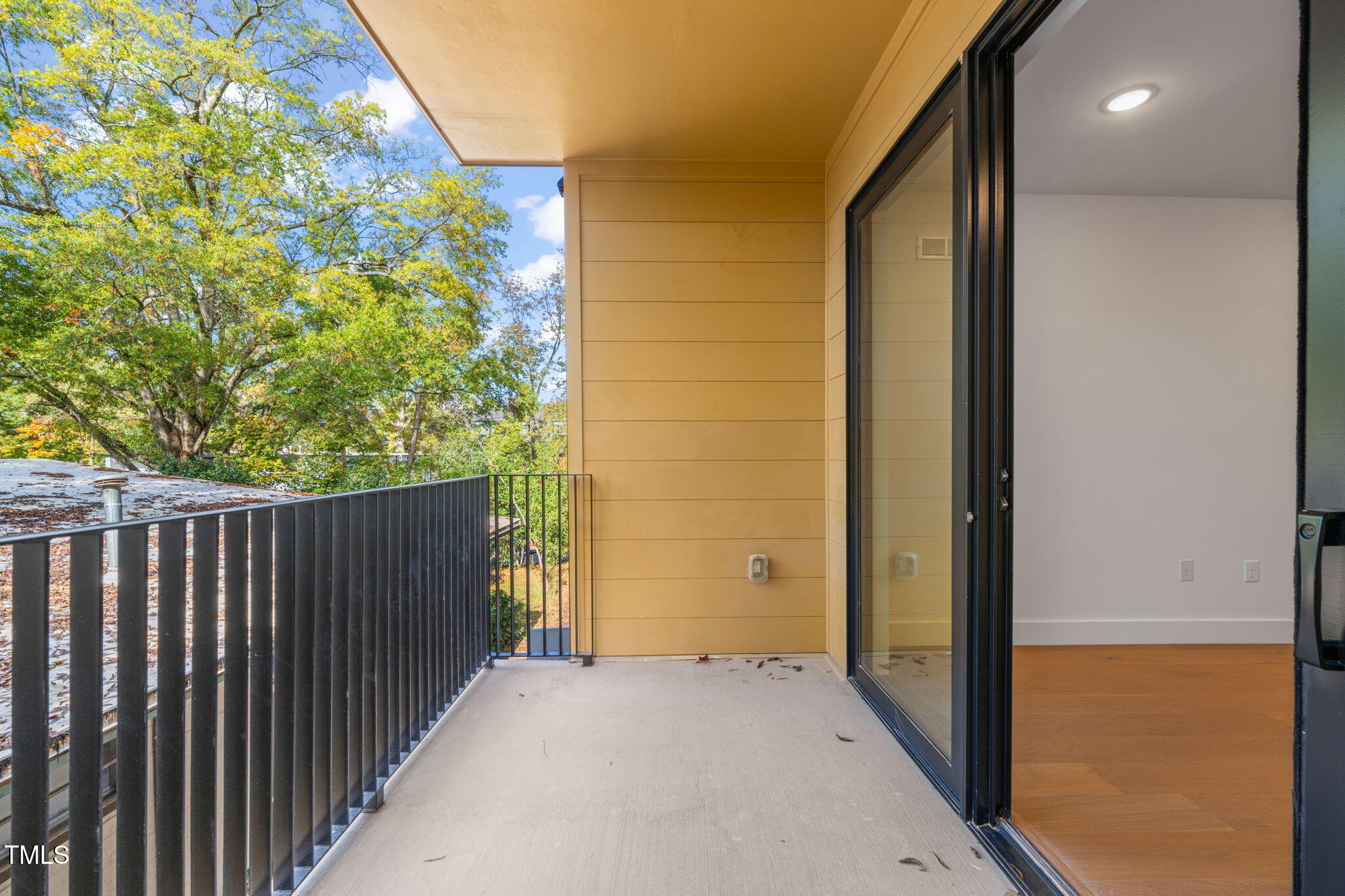 29 Enterprise Street, Unit 209 Raleigh, NC 27607 - Photo 10 of 46 a view of a porch with a door