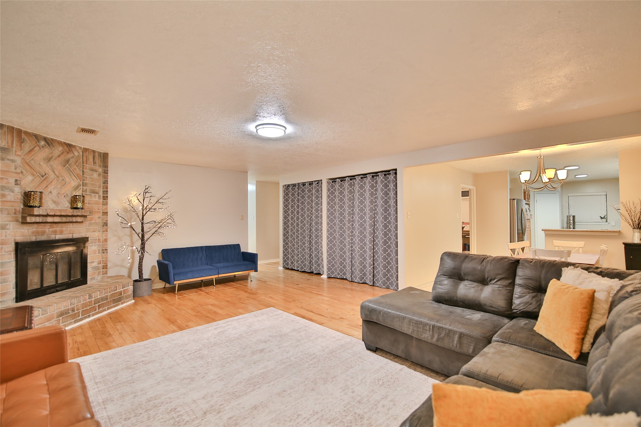 4947 Bridgemont Lane Spring, TX 77388 - Photo 11 of 29 a living room with furniture and a fireplace