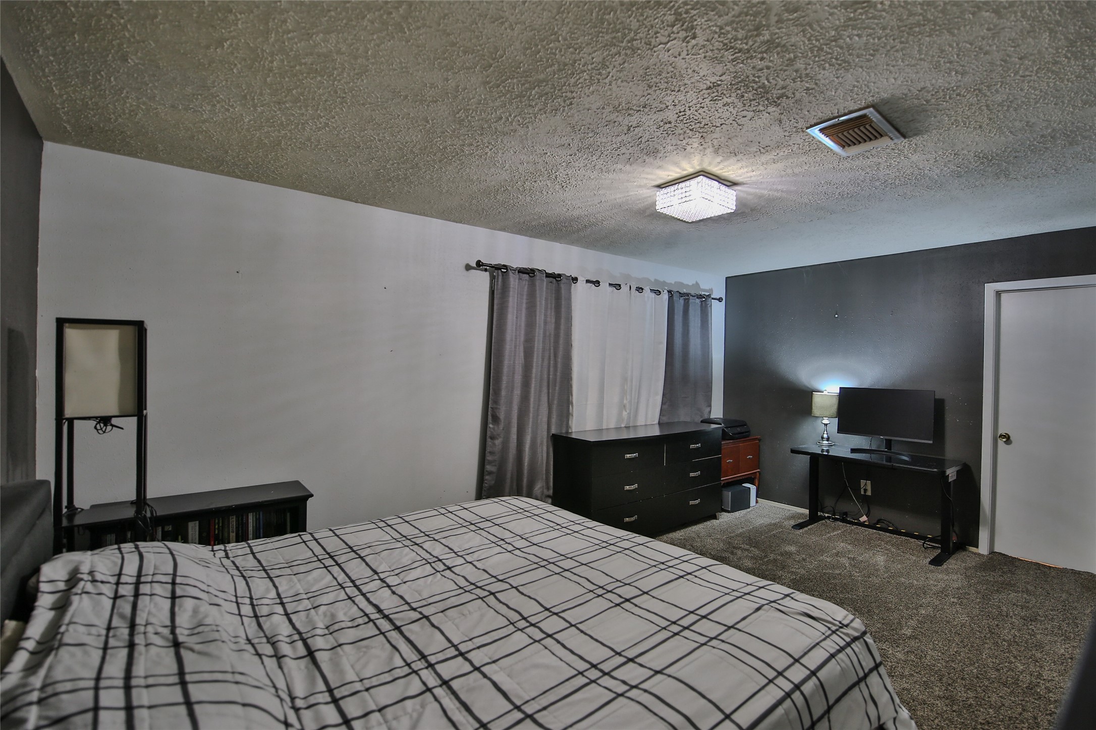 4947 Bridgemont Lane Spring, TX 77388 - Photo 16 of 29 a bedroom with a bed and a closet