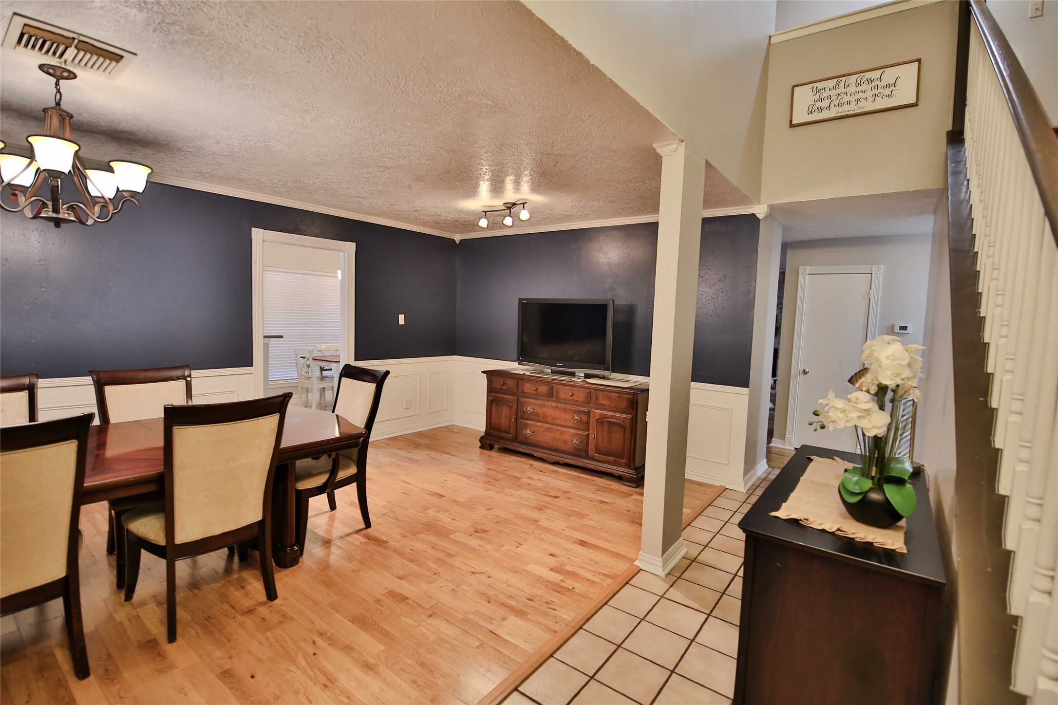 4947 Bridgemont Lane Spring, TX 77388 - Photo 3 of 29 a kitchen with stainless steel appliances kitchen island granite countertop a dining table chairs and a refrigerator