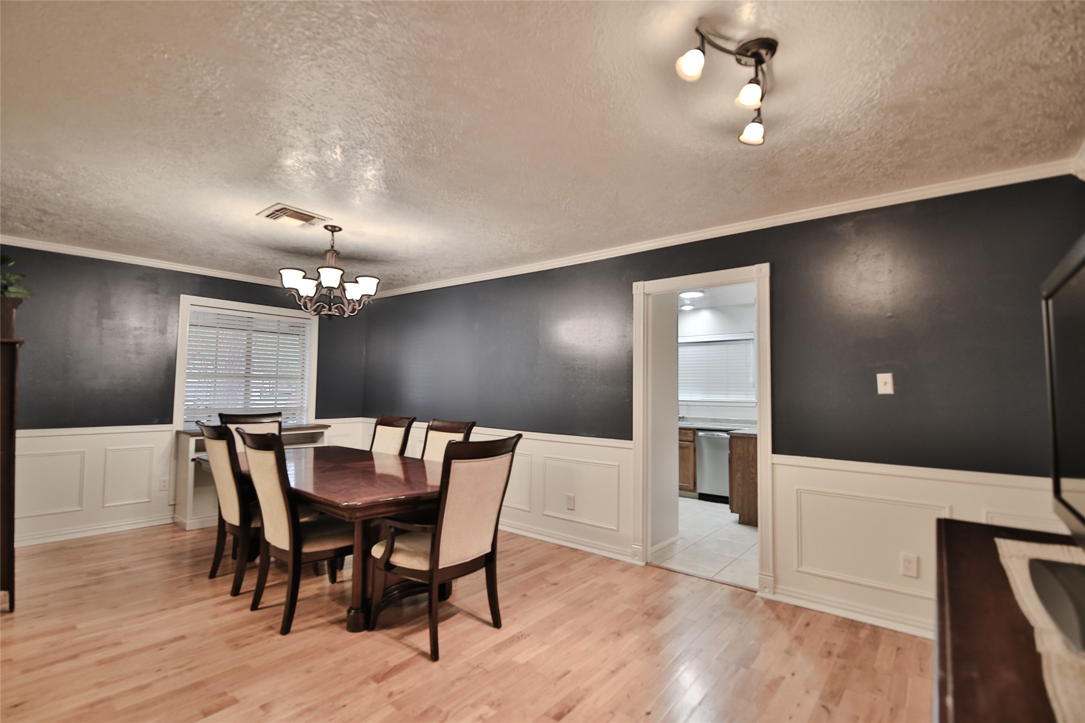 4947 Bridgemont Lane Spring, TX 77388 - Photo 7 of 29 a view of a dining room with furniture and wooden floor