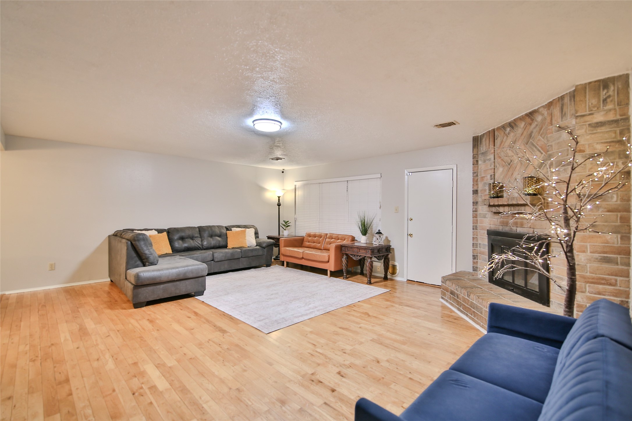 4947 Bridgemont Lane Spring, TX 77388 - Photo 8 of 29 a living room with furniture and wooden floor