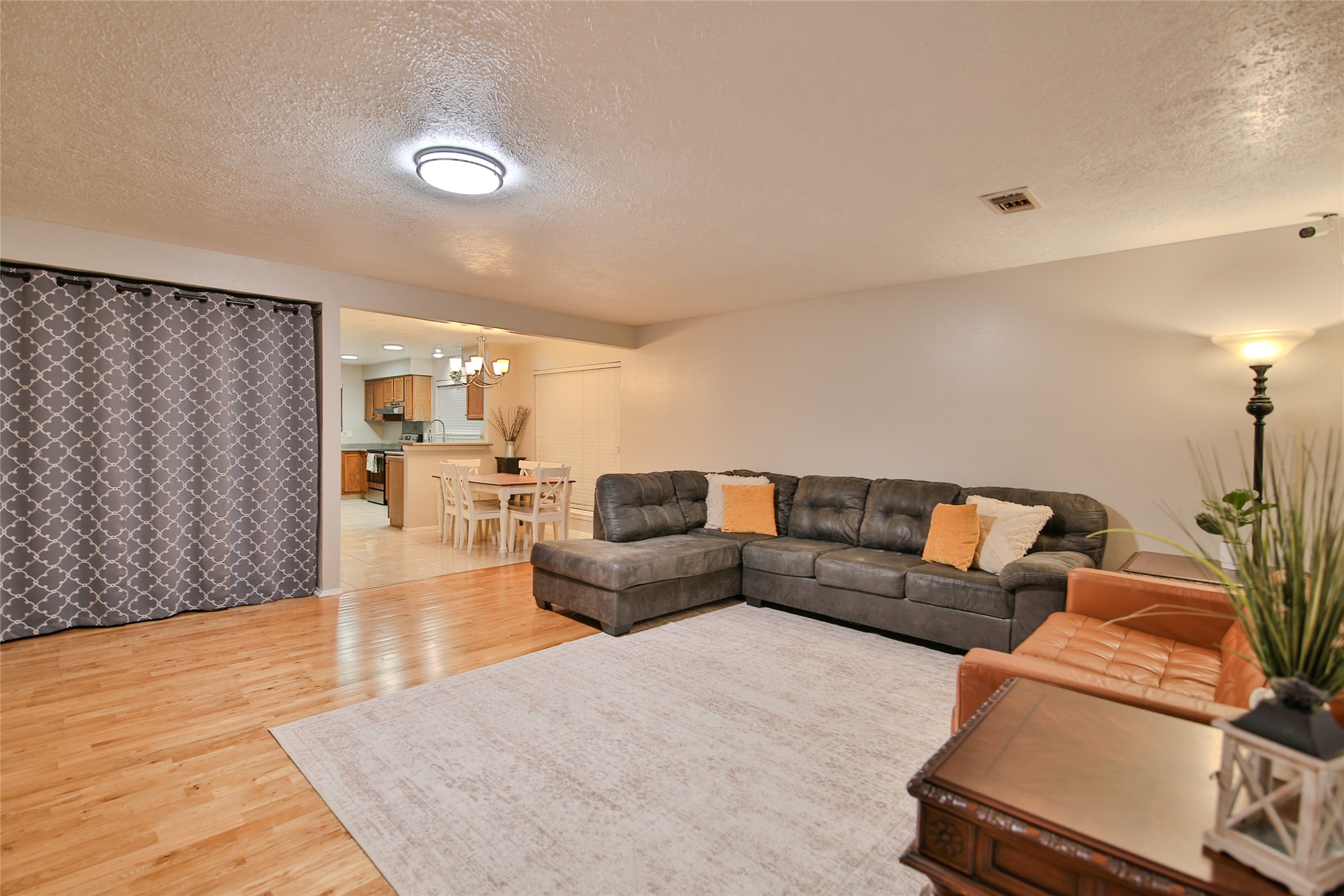 4947 Bridgemont Lane Spring, TX 77388 - Photo 10 of 29 a living room with furniture and view of kitchen