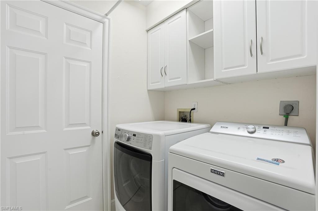 3724 Stone Way Estero, FL 33928 - Photo 27 of 35 Washroom with cabinet space and separate washer and dryer