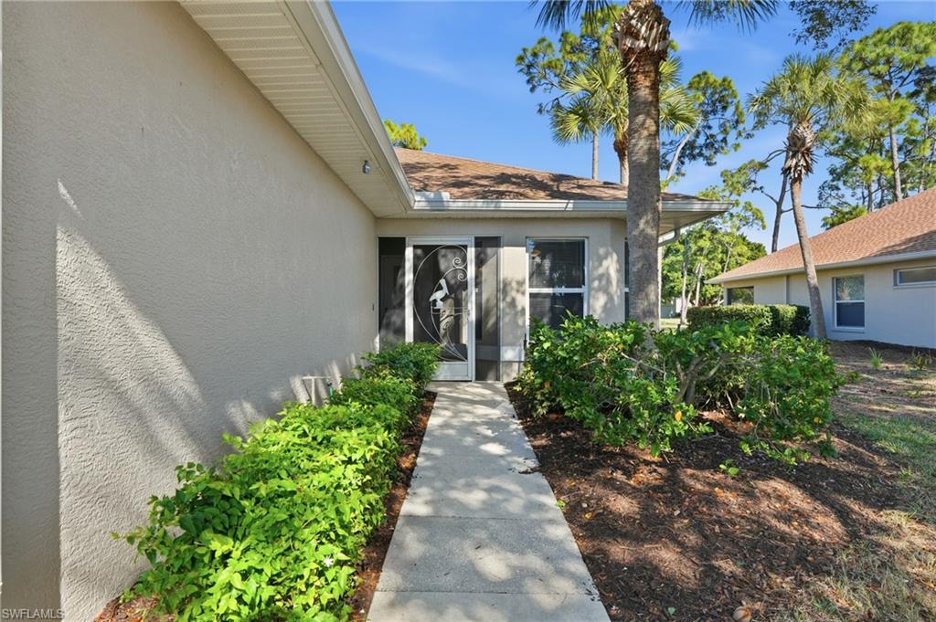 3724 Stone Way Estero, FL 33928 - Photo 4 of 35 Property entrance featuring stucco siding