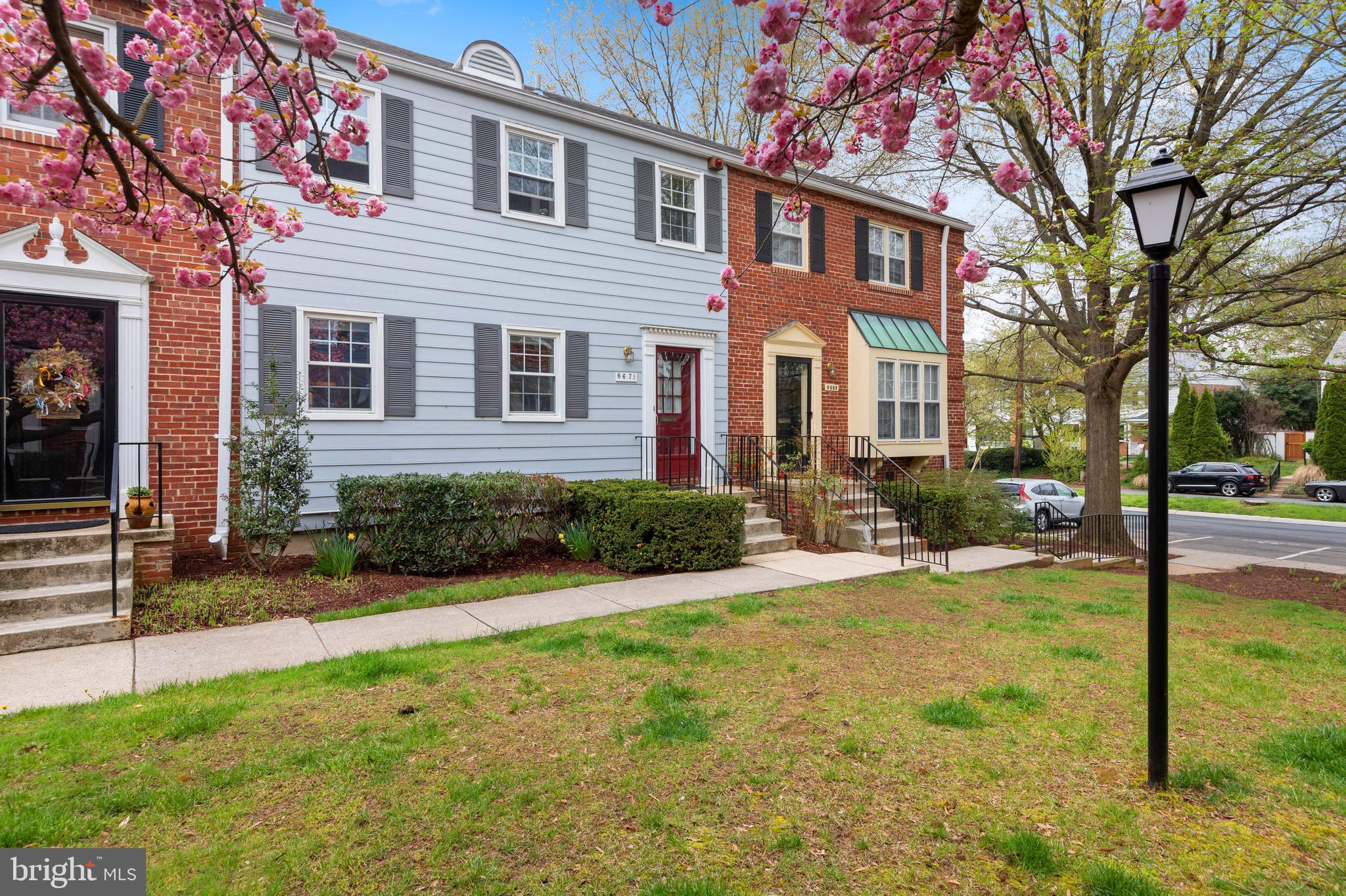 6671 Fairfax Road, Unit 90 Chevy Chase, MD 20815 - Photo 1 of 29 Lovely courtyard graced by Cherry Trees