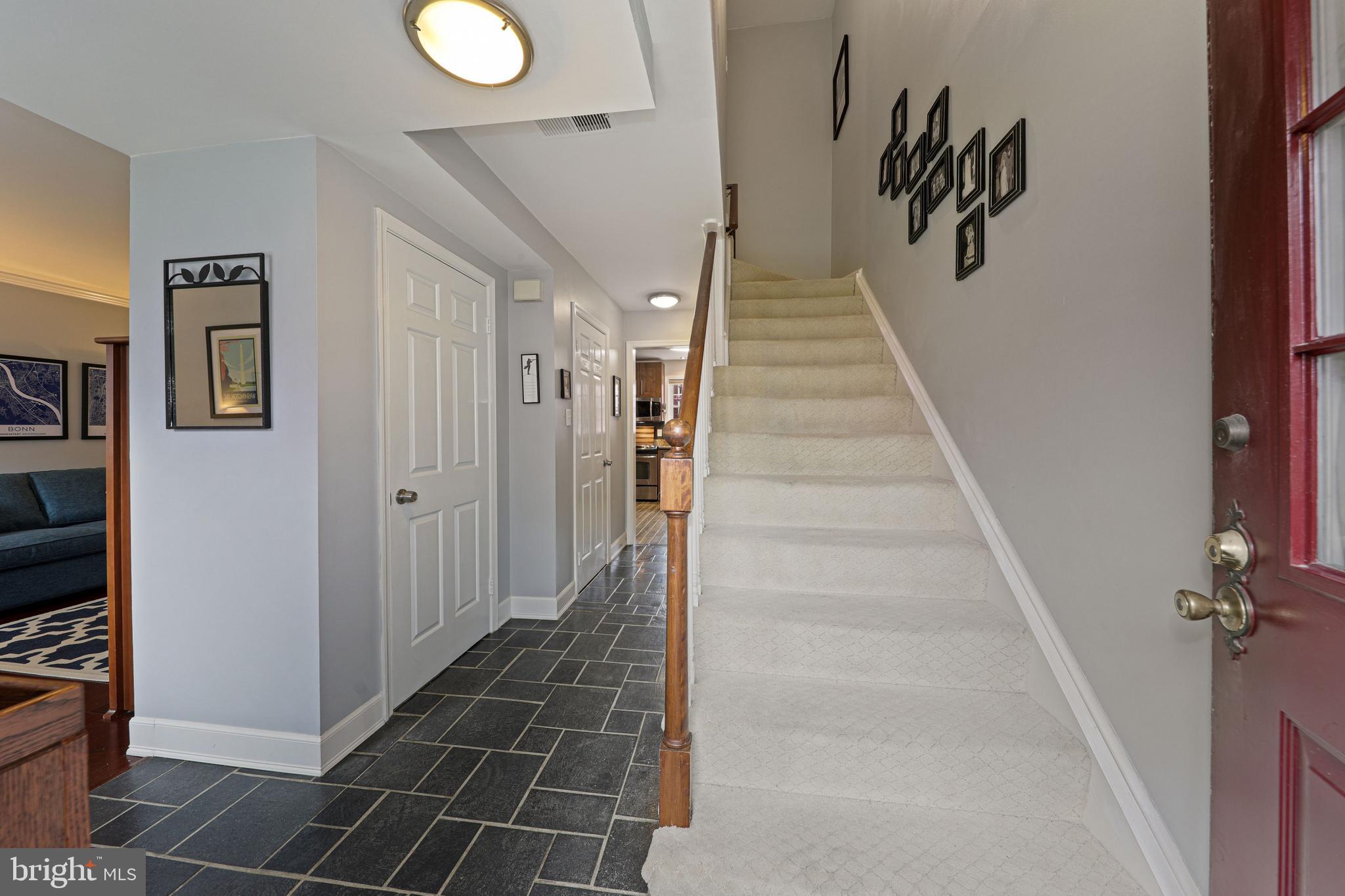 6671 Fairfax Road, Unit 90 Chevy Chase, MD 20815 - Photo 2 of 29 spacious foyer with coat closet & Powder Room