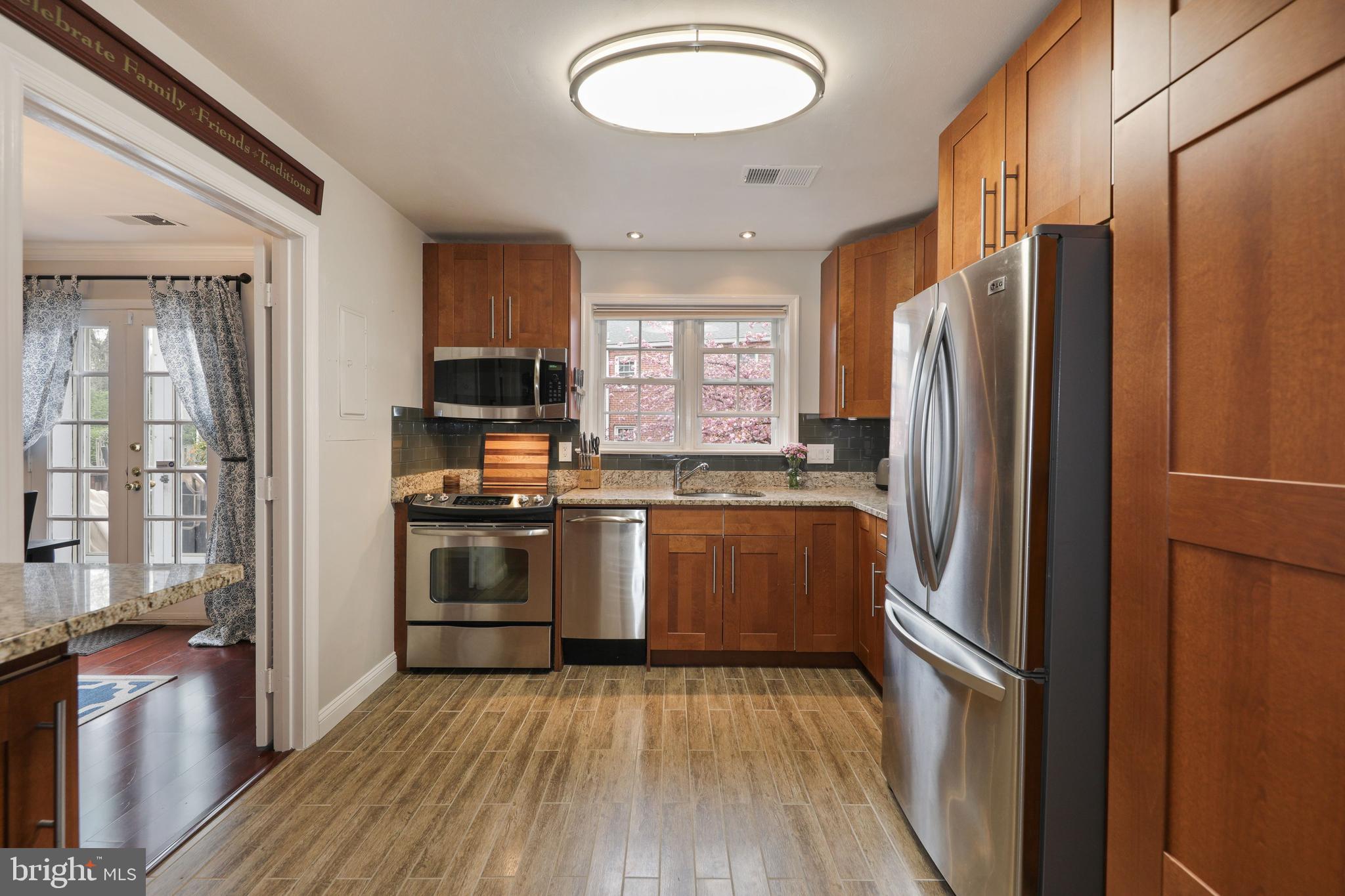 6671 Fairfax Road, Unit 90 Chevy Chase, MD 20815 - Photo 4 of 29 Renovated kitchen with Stainless Steel Appl.