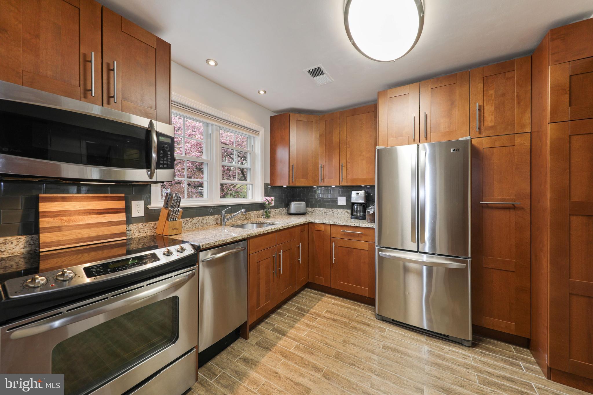 6671 Fairfax Road, Unit 90 Chevy Chase, MD 20815 - Photo 7 of 29 Double window is south facing w/beautiful view