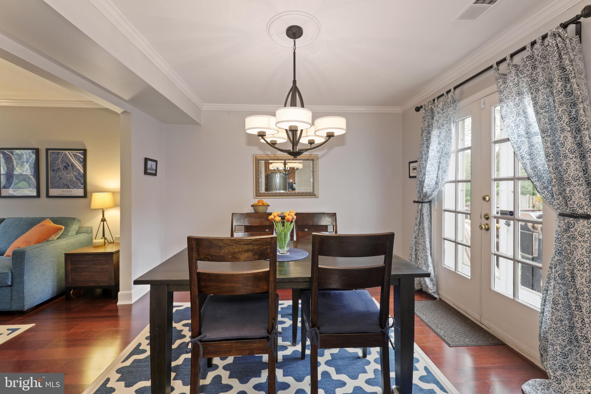 6671 Fairfax Road, Unit 90 Chevy Chase, MD 20815 - Photo 10 of 29 Formal Dining Room w/ French Doors to Deck