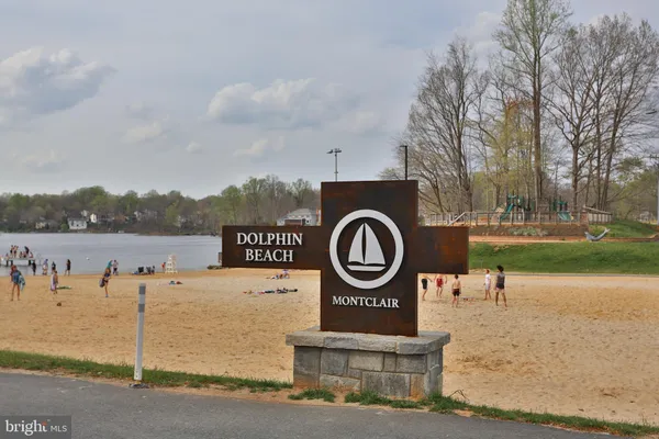 a sign board with a lake view