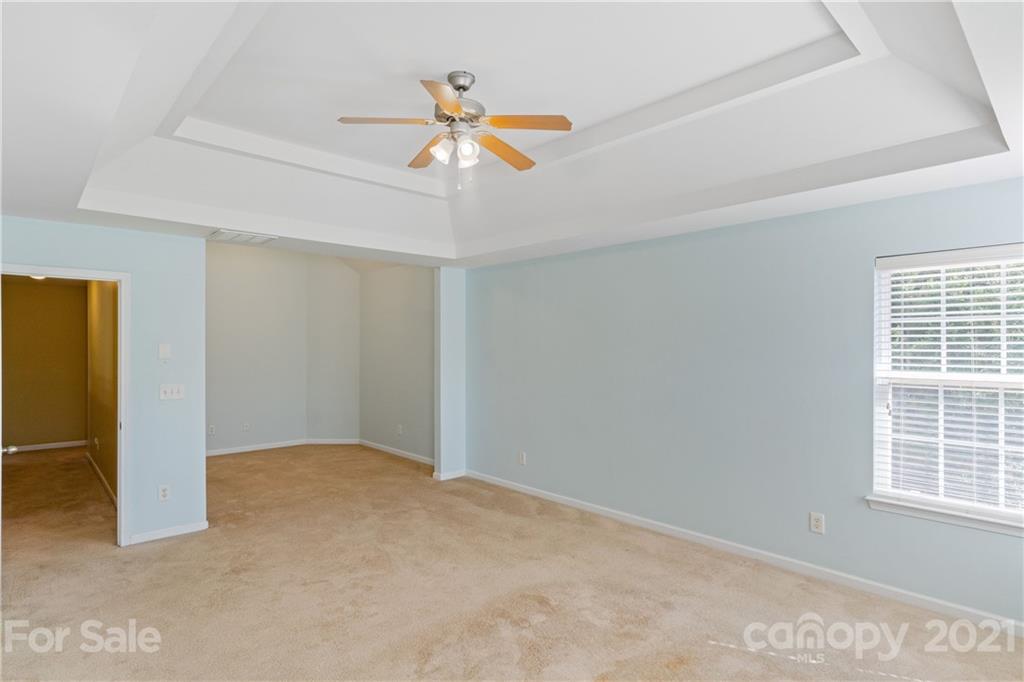 1702 Newland Road Denver, NC 28037 - Photo 22 of 48 a view of an empty room with a window