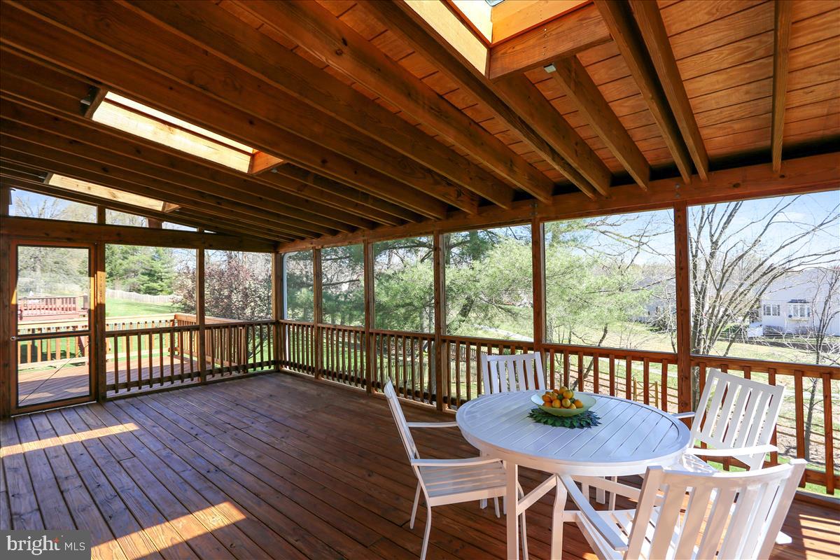 12132 Triple Crown Road North Potomac, MD 20878 - Photo 14 of 26 HUGE SCREENED PORCH WITH SKYLIGHTS