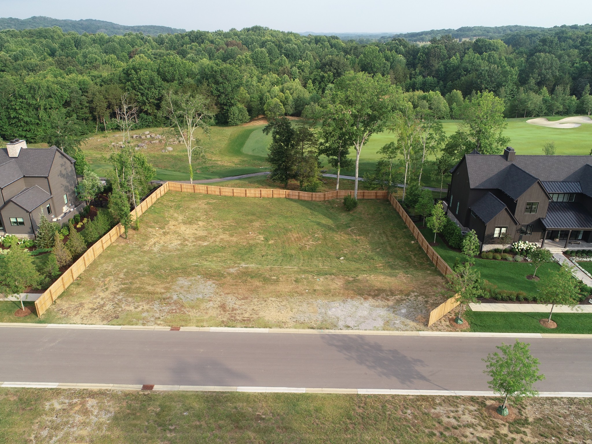 7559 Whiskey Road College Grove, TN 37046 - Photo 5 of 25 a view of a swimming pool with a yard