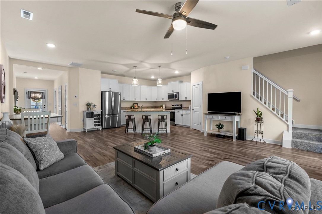 12576 Petrel Crossing Midlothian, VA 23112 - Photo 12 of 30 Living area featuring recessed lighting, stairs, c
