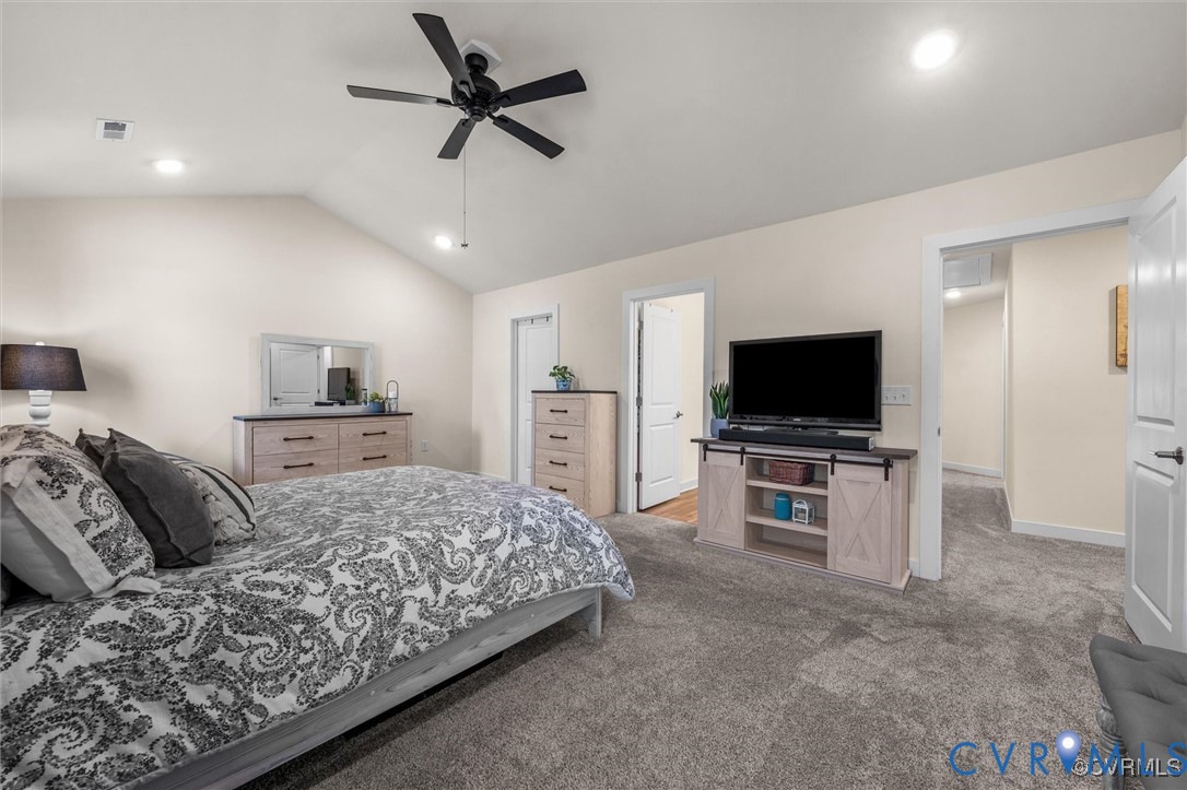 12576 Petrel Crossing Midlothian, VA 23112 - Photo 15 of 30 Bedroom with lofted ceiling, light colored carpet,