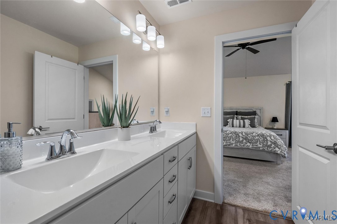 12576 Petrel Crossing Midlothian, VA 23112 - Photo 20 of 30 Ensuite bathroom with double vanity, a ceiling fan