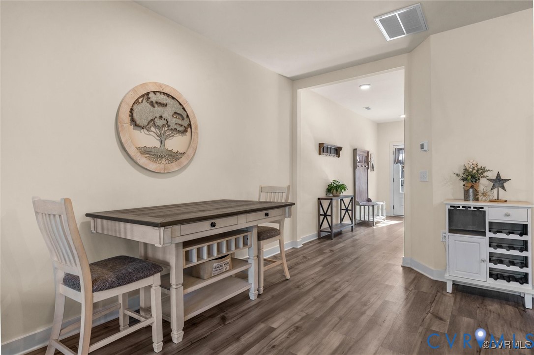 12576 Petrel Crossing Midlothian, VA 23112 - Photo 9 of 30 Dining area featuring baseboards and dark wood-typ