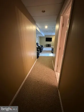 a view of hallway with stairs