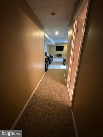 a view of hallway with stairs