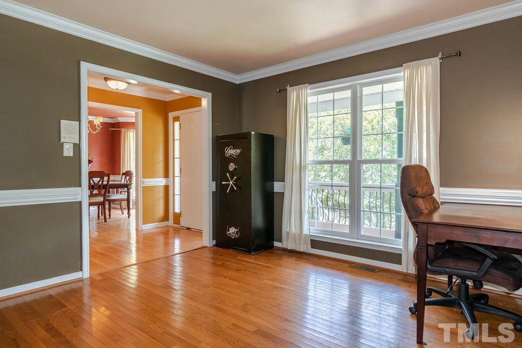 1224 Red Brick Road Garner, NC 27529 - Photo 11 of 30 a view of a livingroom with furniture and hardwood floor