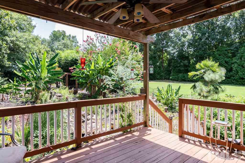 1224 Red Brick Road Garner, NC 27529 - Photo 25 of 30 a view of a porch with wooden floor
