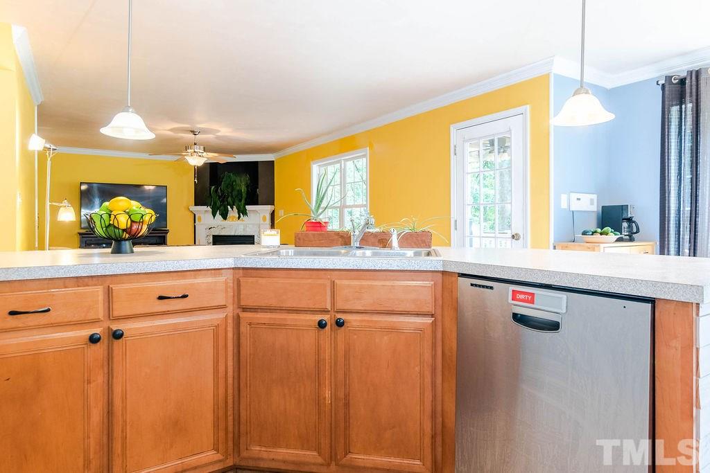 1224 Red Brick Road Garner, NC 27529 - Photo 7 of 30 a kitchen with a sink and a large window