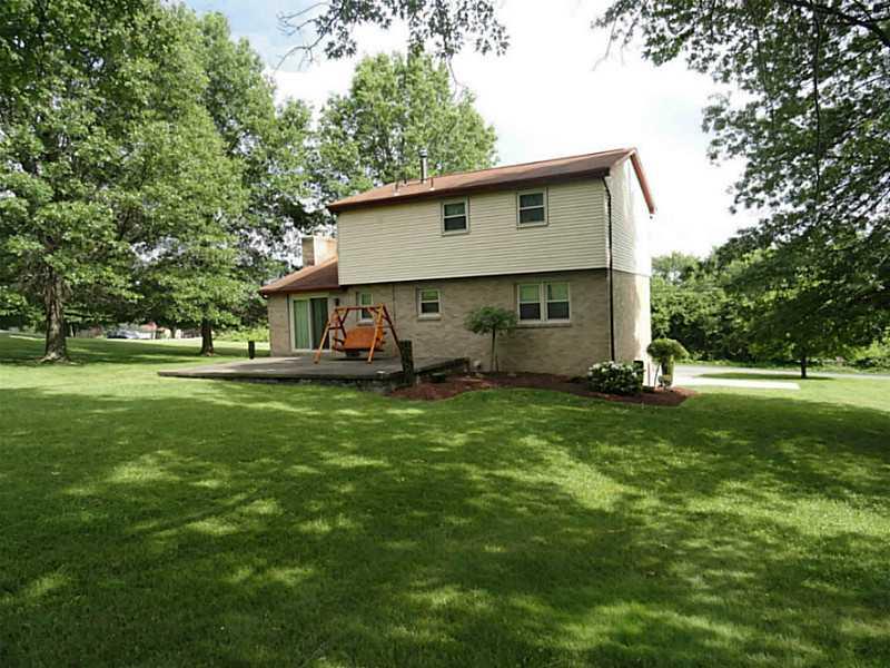 261 Waugaman Road Harrison City, PA 15636 - Photo 19 of 25 Exterior Back. Updated windows throughout