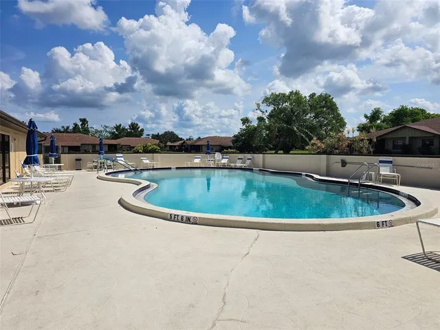 a view of a swimming pool and outdoor space