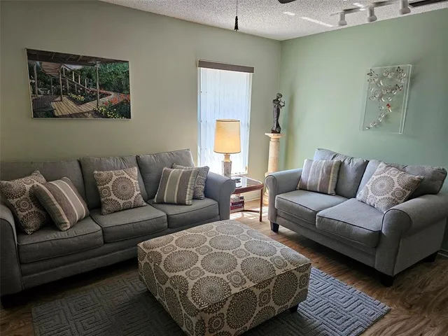 a living room with furniture and a couch